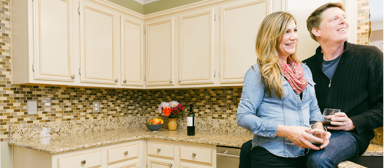 kitchen that has been refinished by NHance made couple happy