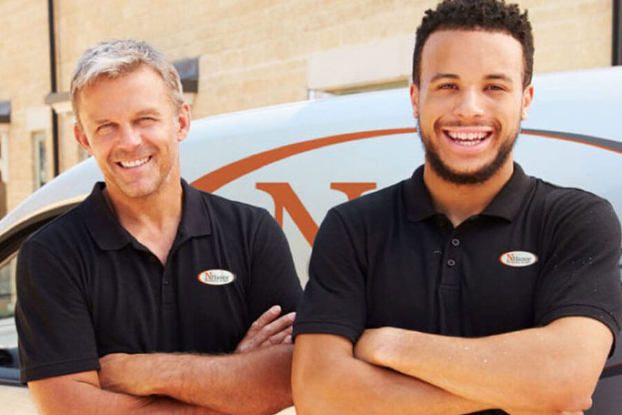 Photo of smiling N-Hance Employees